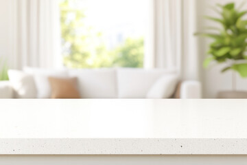 Modern living room with a white sofa, houseplant, and natural light. White counter in foreground
