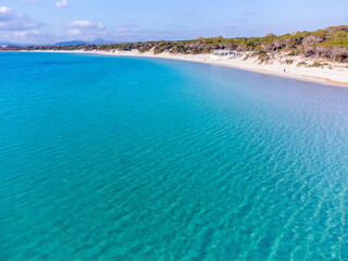Obraz premium Drone view of Maria Pia beach under a blue sky