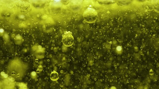 Macro Slow-Motion Footage of Oil Molecules and Bubbles in Water