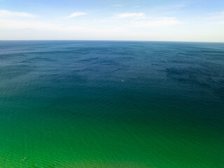 Obraz premium Sea surface aerial view,Bird eye view photo of waves water surface texture,Summer sea background,Beautiful nature Amazing view sea background