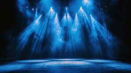 Empty stage lit with blue spotlights