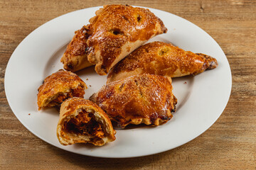 Delicious pumpkin-filled pastries served on a white plate