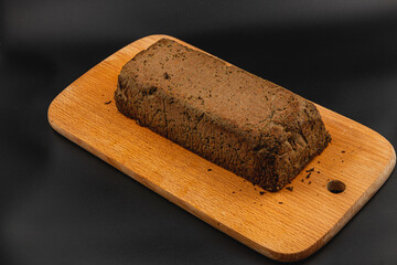 Homemade chicken liver pate served on a wooden cutting board