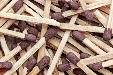 Scattered Wooden Matches with Brown Tips. Wooden Matchsticks with Brown Heads