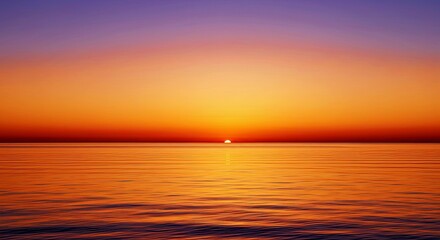 Obraz premium Calm sea reflects soft peach color gradient from tranquil ocean sunrise creating peaceful serene morning view