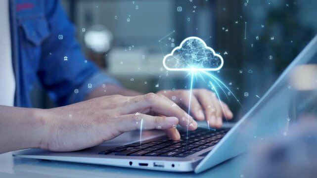 Close-up of hands typing on a laptop with a digital cloud icon overlay, representing cloud computing, data storage, and online connectivity.