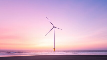 Obraz premium Coastal wind turbine at sunset