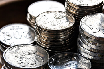 Bright Close-Up of Indonesian Rupiah Coins. Macro Shot of 500, 1000, and 200 IDR Denominations