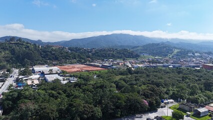 Aerial view of a vast forest landscape with dense vegetation, showcasing natural preservation, biodiversity, environmental balance and untouched green scenery