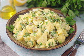 A bowl with Greek potato salads	