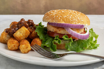 salmon burger with   chlli tater tots,