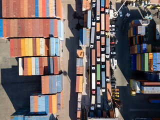 American duties, trucks carrying containers waiting to enter the port's storage area