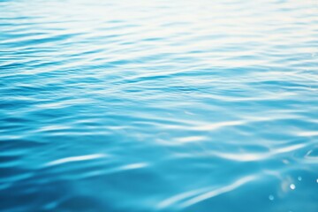 Naklejka premium Water surface, waves, bright sun. Ocean, sea, clean & refreshing