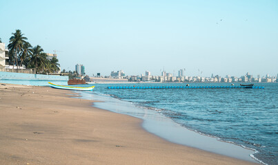 Juhu beach and skyline of Mumbai, India, travel destination in Asia, tropical west coast, Arabian Sea 