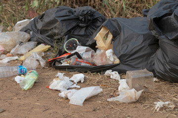 Overflowing trash can_trash bin_garbage can in a Phichit in THAILAND_25 March 2025