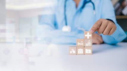Health insurance concept, Access to welfare health concept, Doctor holding a wooden block with plus...