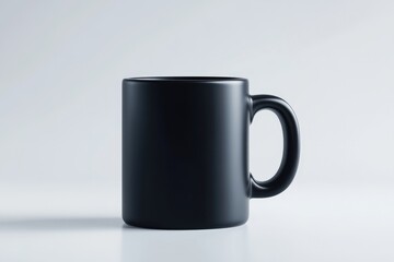 Obraz premium Black mug on white surface