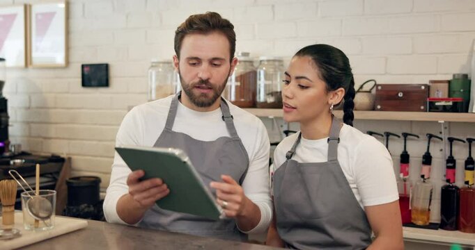 People, waiter and talk with tablet at cafe for online order, staff training and inventory management. Man, woman and discussion with digital for stock check, menu update and feedback of performance