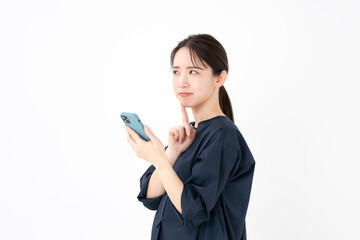 スマホ・悩む女性