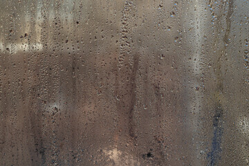 water drops on wet glass. abstract background.