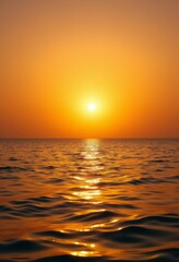   a beautiful sunset over the ocean, with the sun setting in the sky and reflecting off the water's surface