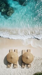 Aerial view showing beach chairs and umbrellas near the ocean waves