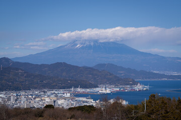 top view of city beside sea coast with snow cap mountain Fuji is very beautiful land scape Shizuoka Japan 