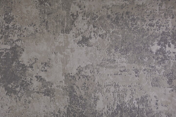 Grunge gray wall with rough concrete and plaster texture, blending abstract surface with industrial charm. Perfect for vintage decor and interior design. Industrial vintage surfaces concept