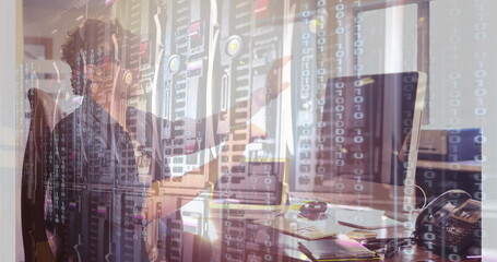 Binary code and data servers over person working at computer in office