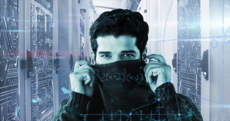 Image of handwritten mathematical equations moving over portrait of man covering face with jumper an