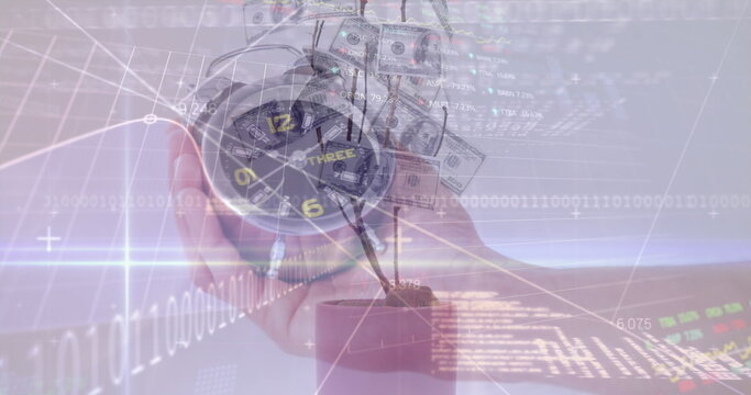 Digital composite image of financial data processing against man holding alarm clock