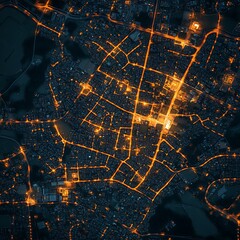 An aerial view of a city at night illuminated by lights