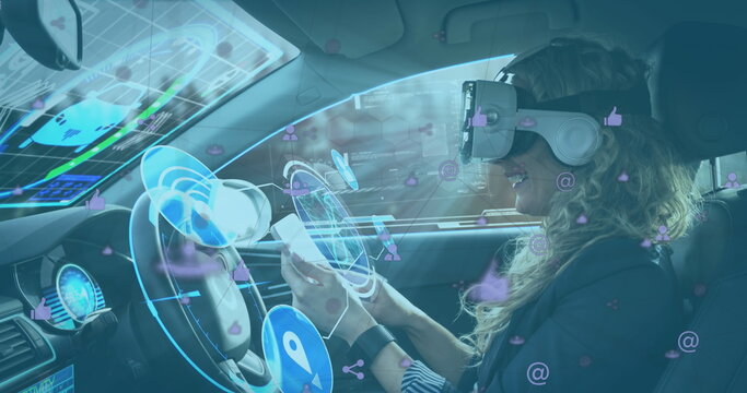 Image of displays and icons with woman in vr headset using smartphone in self driving car - Powered by Adobe