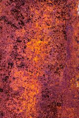 Dark rusted metal with orange highlights