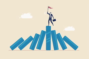 Winner take all, survive business competition or strength to overcome difficulty, economic crisis or recession, business winner concept, success businessman on stand strong bar graph domino collapse.