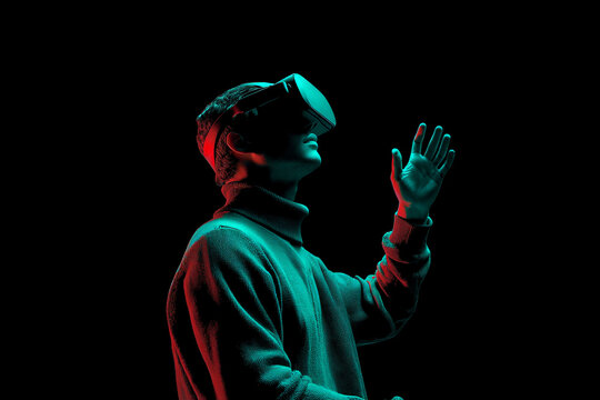 Person wearing VR headset, hand outstretched, illuminated by red and teal light against black background, showcasing virtual reality experience and technological advancement