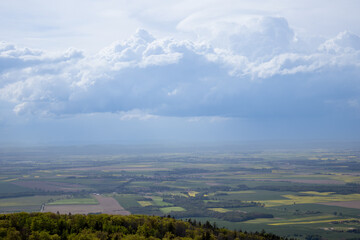 Naklejka premium Cloudy day view over rural landscape