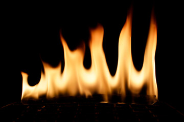 Fire Flames Flickering Brightly Against Black Background