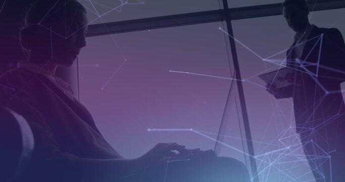 Image of network of connections over man and woman in airport lounge using electronic devices