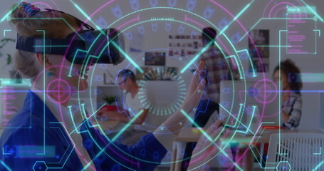 Neon scope scanner against caucasian woman gesturing while wearing vr headset at office