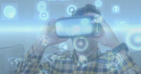 Image of scopes scanning over man wearing vr headset