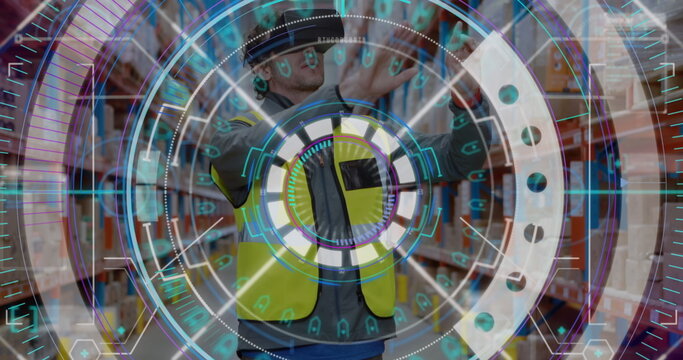 Image of scope scanning over male warehouse worker wearing vr headset and moving hands