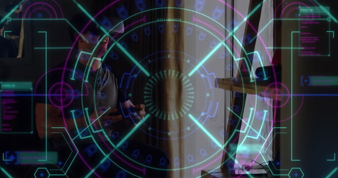 Data processing and scope scanning over caucasian man wearing vr headset while playing image games