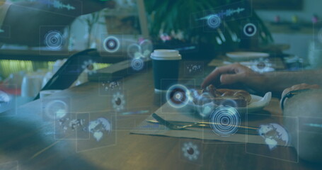 Image of scopes scanning and data processing on screens over payment with terminal