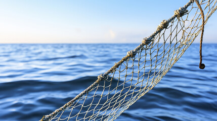 Depleted ocean with empty fishing net against serene blue backdrop