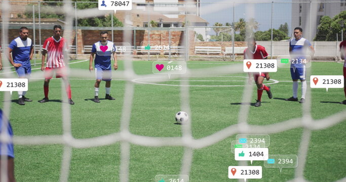Image of social media icons and numbers on banners over football player kicking ball - Powered by Adobe