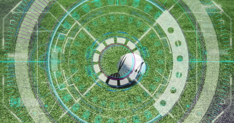 Image of scope scanning and data processing over football player kicking ball