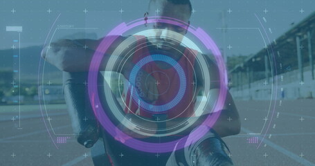 Image of scope scanning over disabled male athlete with running blades on racing track