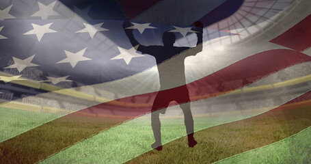 Waving us flag over silhouettes of male soccer player in different poses against sports stadium