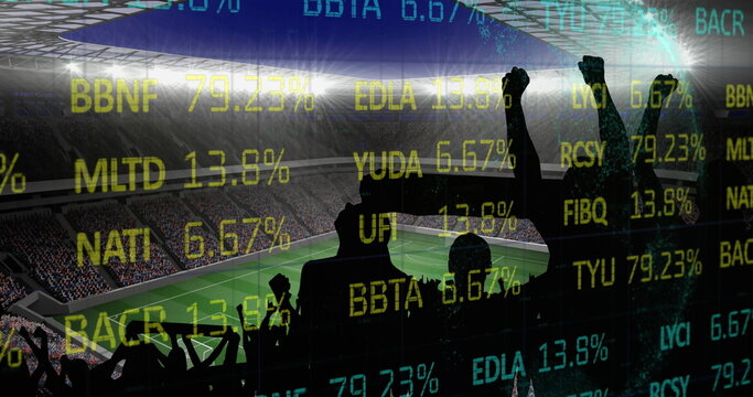 Stock market data processing against silhouette of fans cheering and sports stadium in background